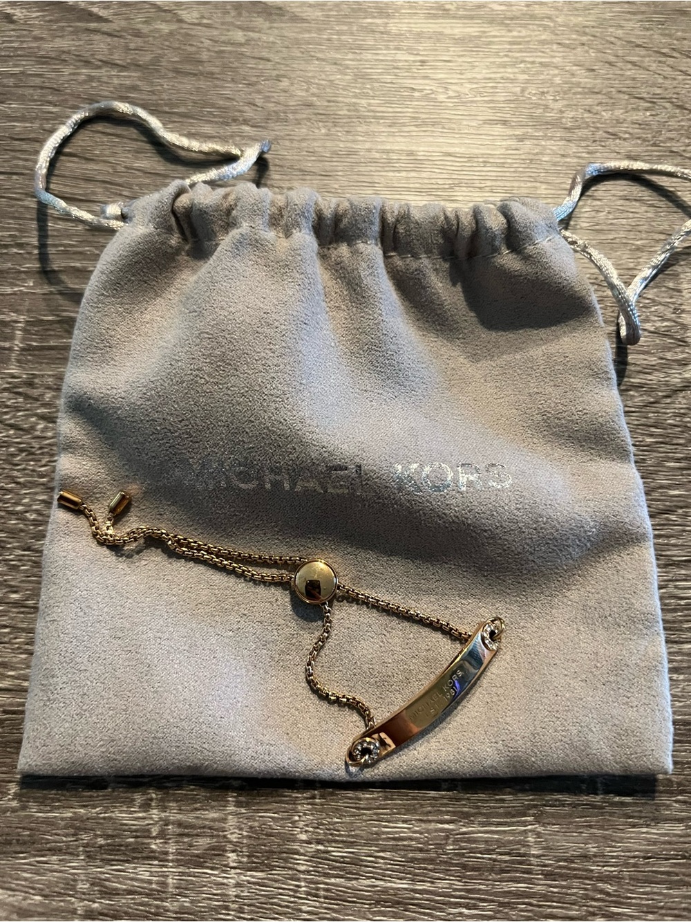Michael Kors Gold Tone ID Bar Adjustable Bracelet and Dust Bag